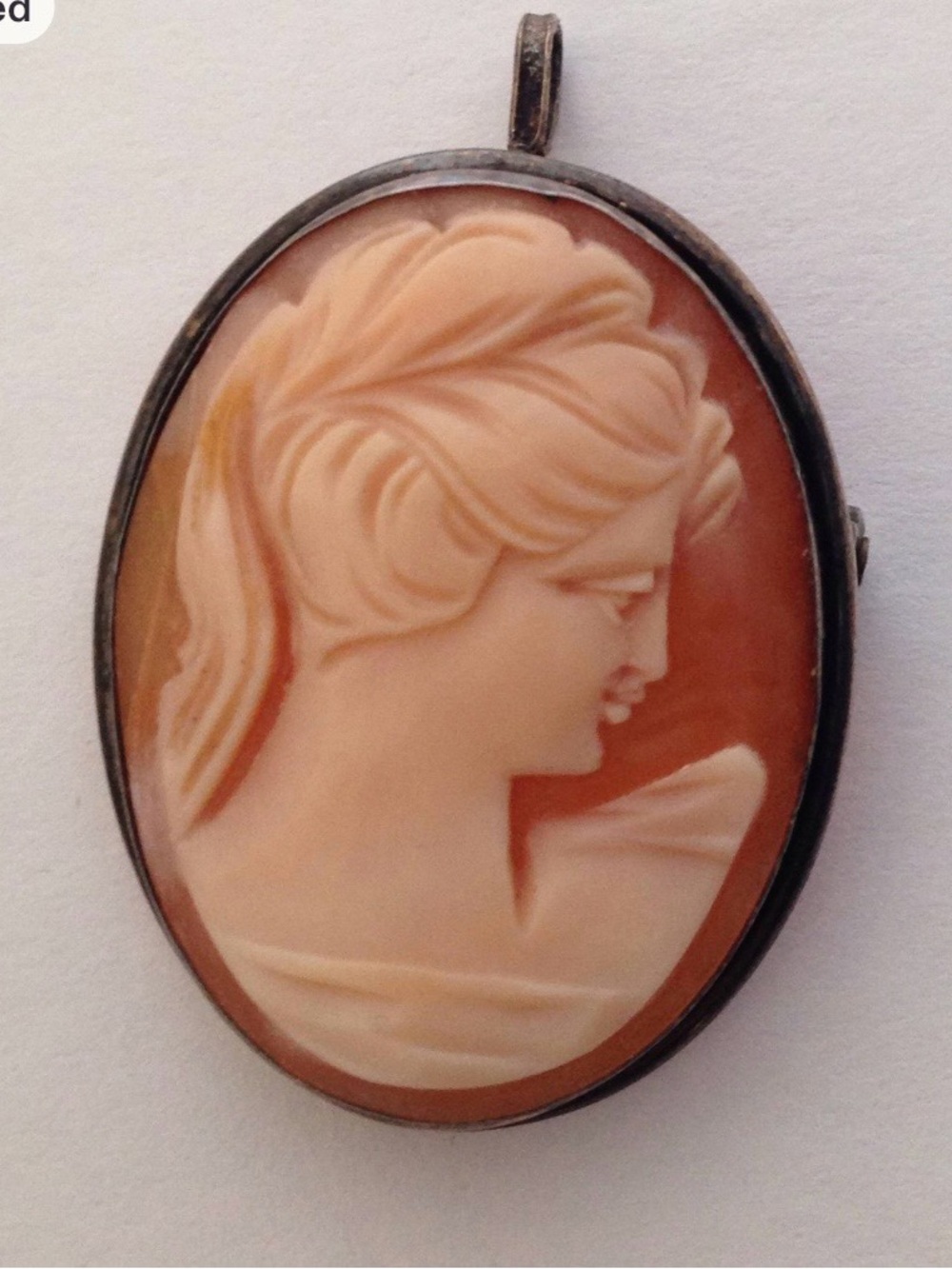 Classic Peach Cameo Pendant brooch necklaces. Sterling silver frame.